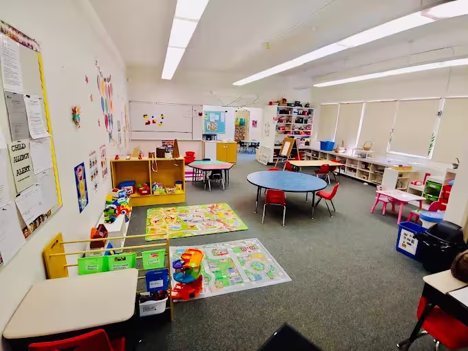 top-view-cute-babies-with-stuffed-animal Dicoverers Daycare